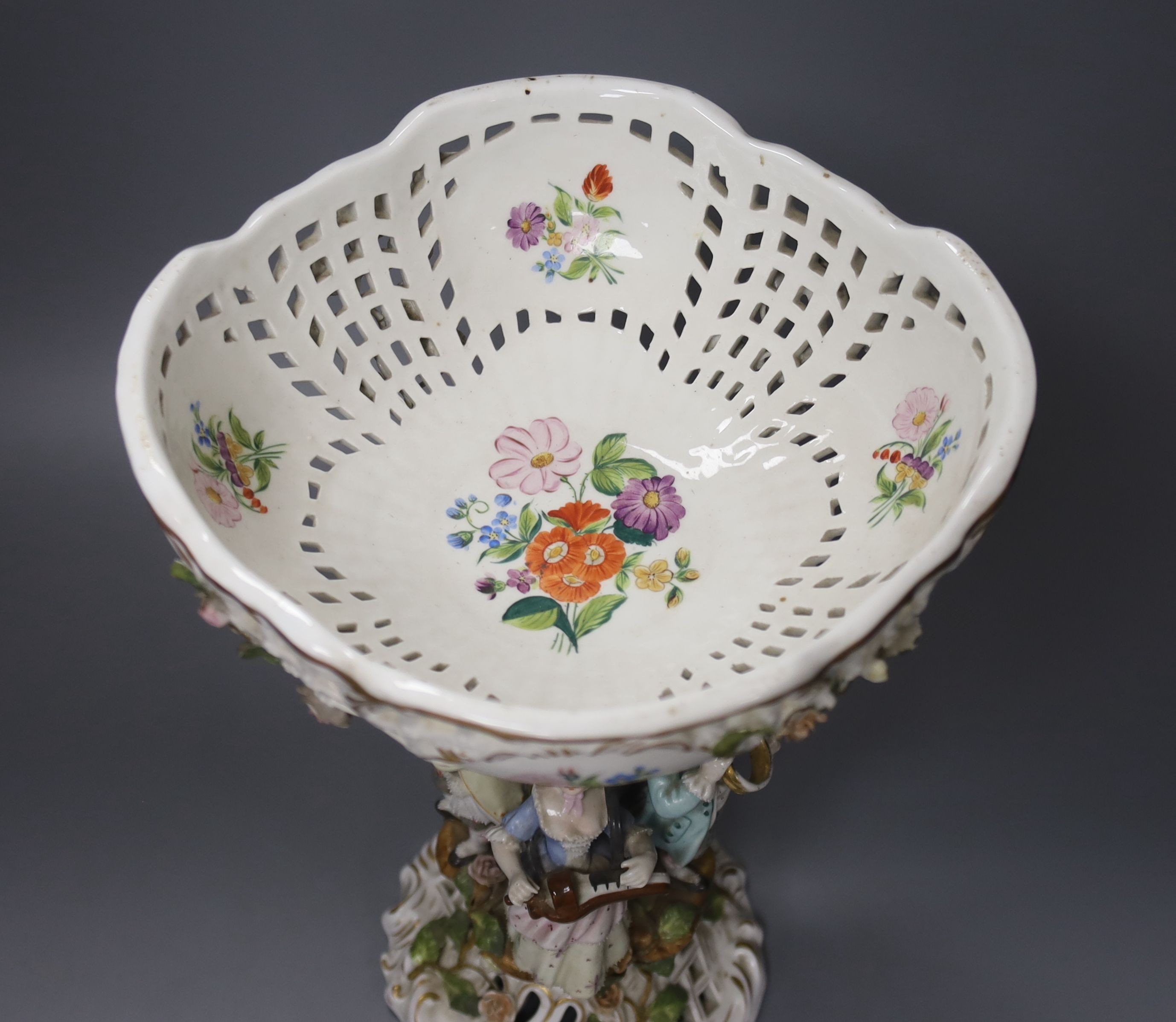 A Sitzendorf porcelain figural centrepiece 28cm